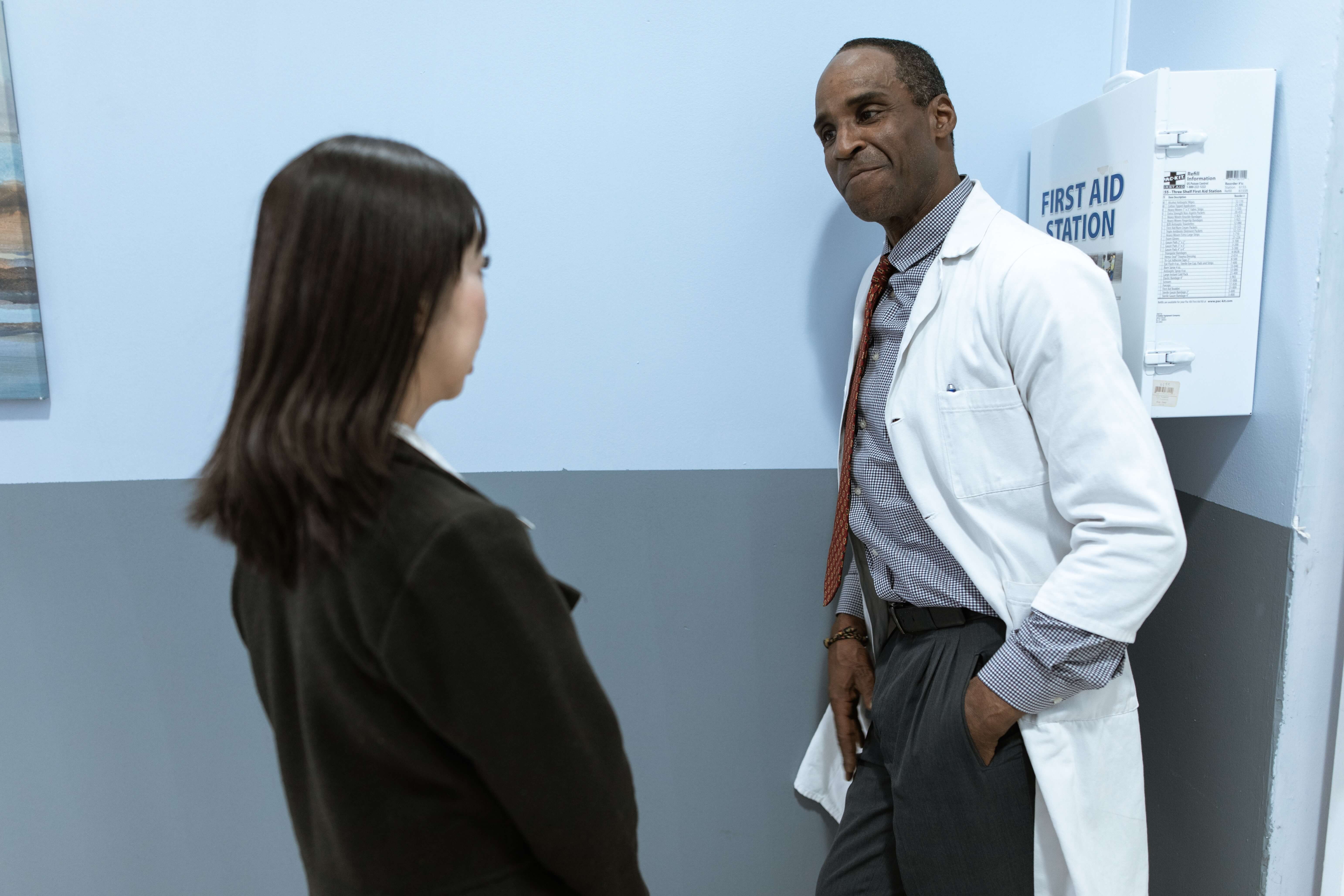 Image of a healthcare provider helping a patient